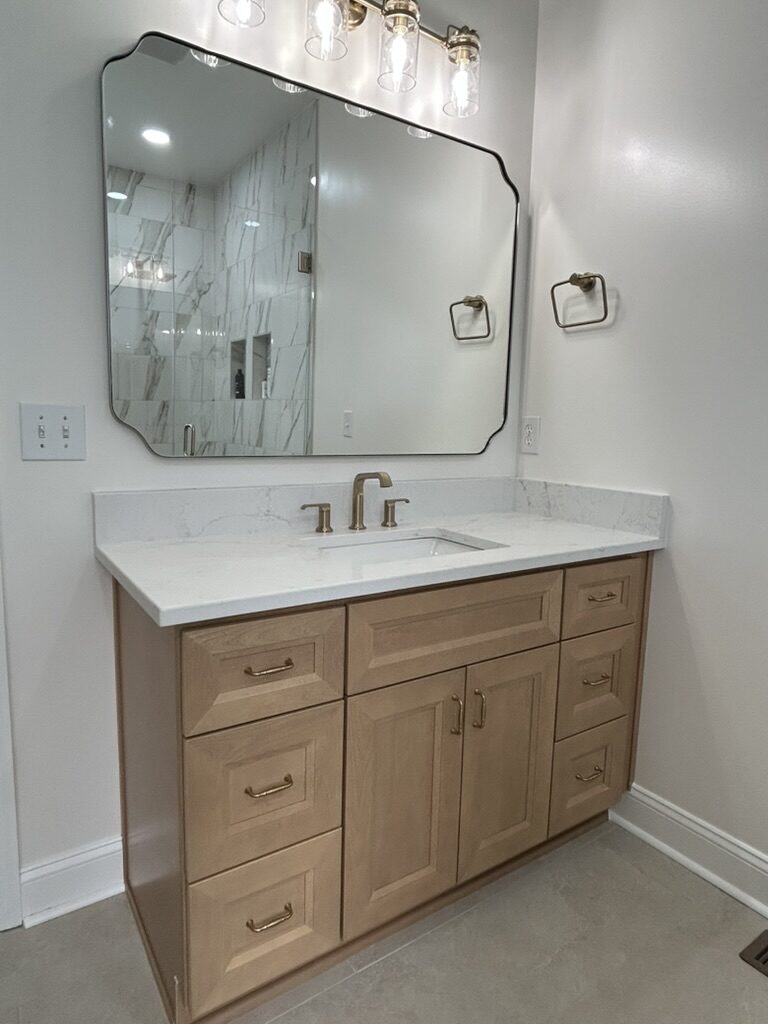 Vanity with framed mirror in a Murfreesboro, TN bathroom